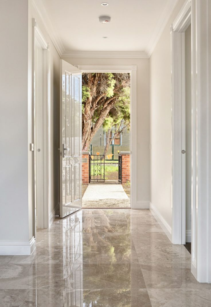 High gloss foyer tiles design