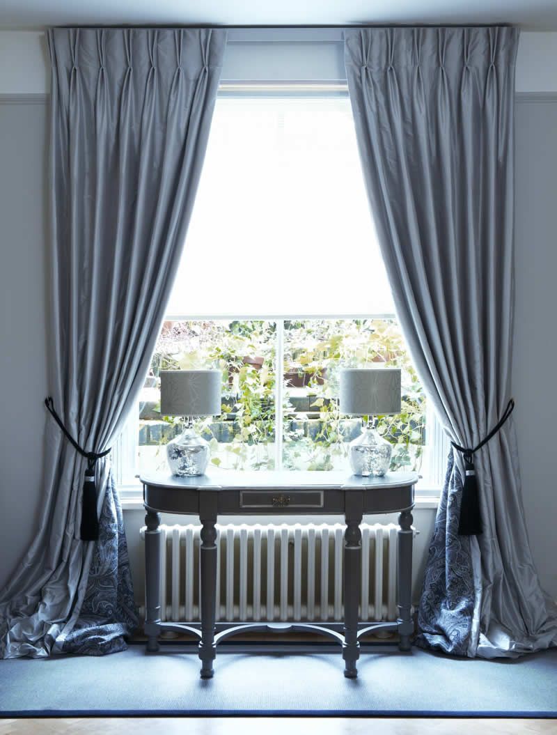 Properly hung, drapes look luxurious and full.
