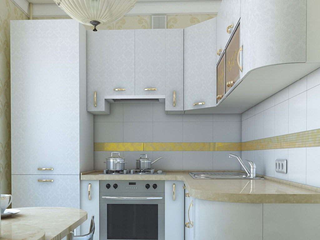Холодильник белого цвета в интерьере светлой кухни