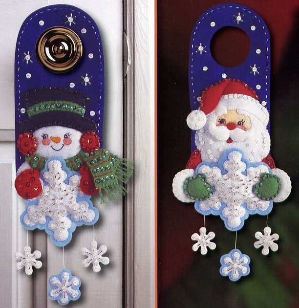 Santa Claus and Snowman is usual characters for door decoration