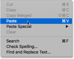 Choosing the Paste command from under the Edit menu in Photoshop.